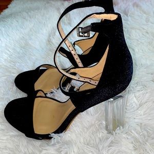 Black with glass heels. Normal wear